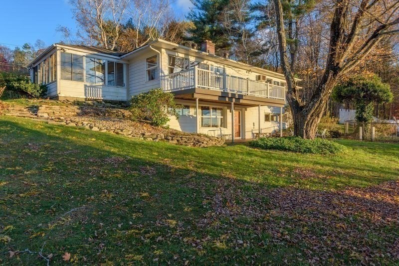 41 Arnold Road Pelham, MA 01002 - Photo 34 of 42 a view of a yard in front of a house with a big yard