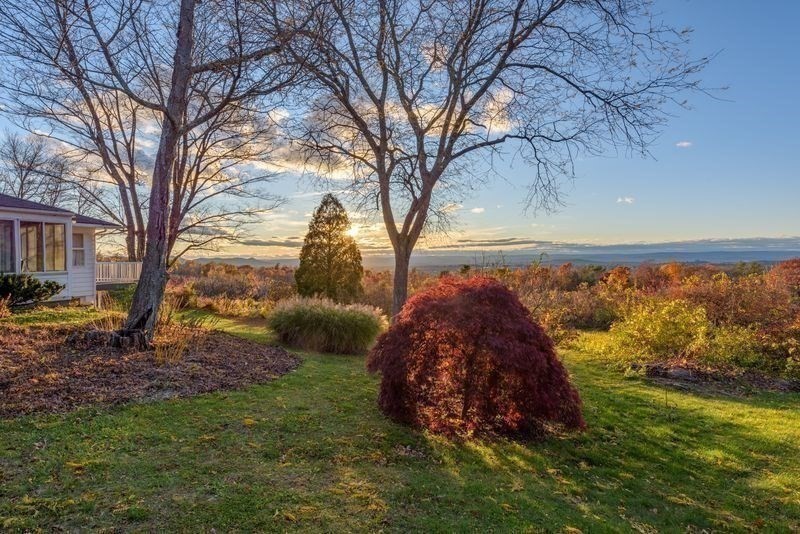 41 Arnold Road Pelham, MA 01002 - Photo 35 of 42 a backyard of a house with lots of green space
