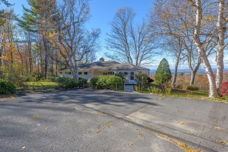 41 Arnold Road Pelham, MA 01002 - Photo 4 of 42 a view of road and trees