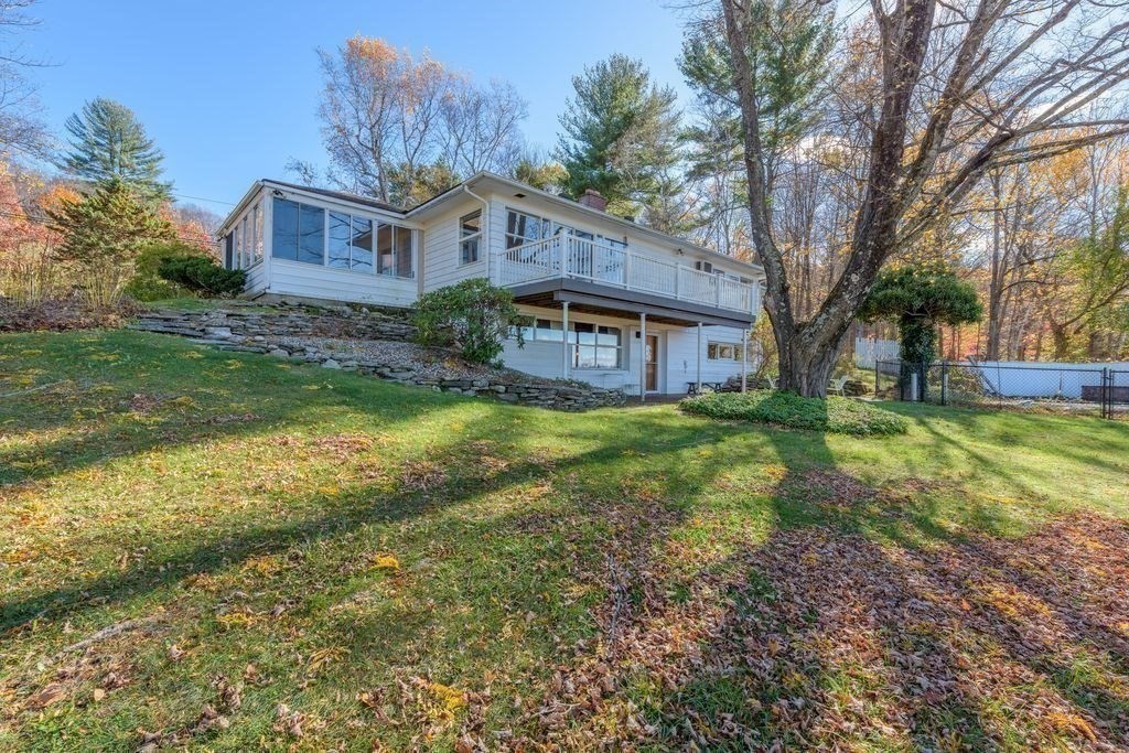 41 Arnold Road Pelham, MA 01002 - Photo 6 of 42 a view of a house with a yard