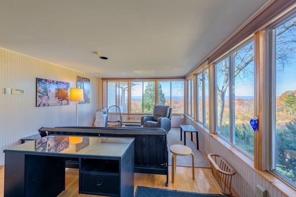 41 Arnold Road Pelham, MA 01002 - Photo 9 of 42 a view of a workspace with furniture and window