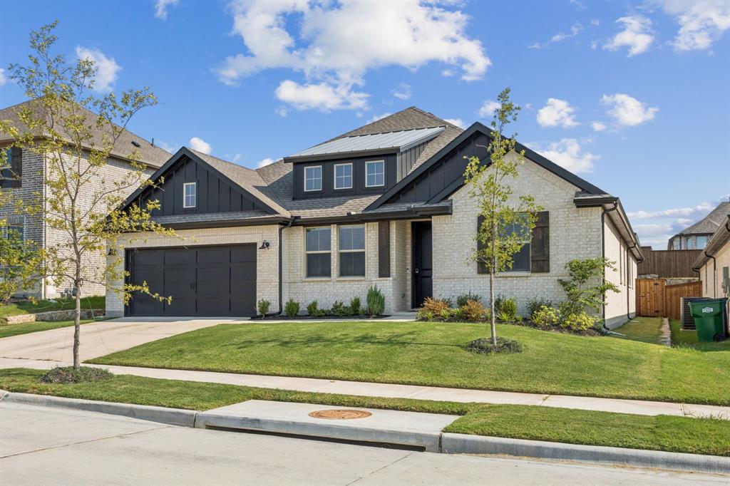 1415 Potenza Road Fate, TX 75087 - Photo 1 of 29 a front view of a house with a yard