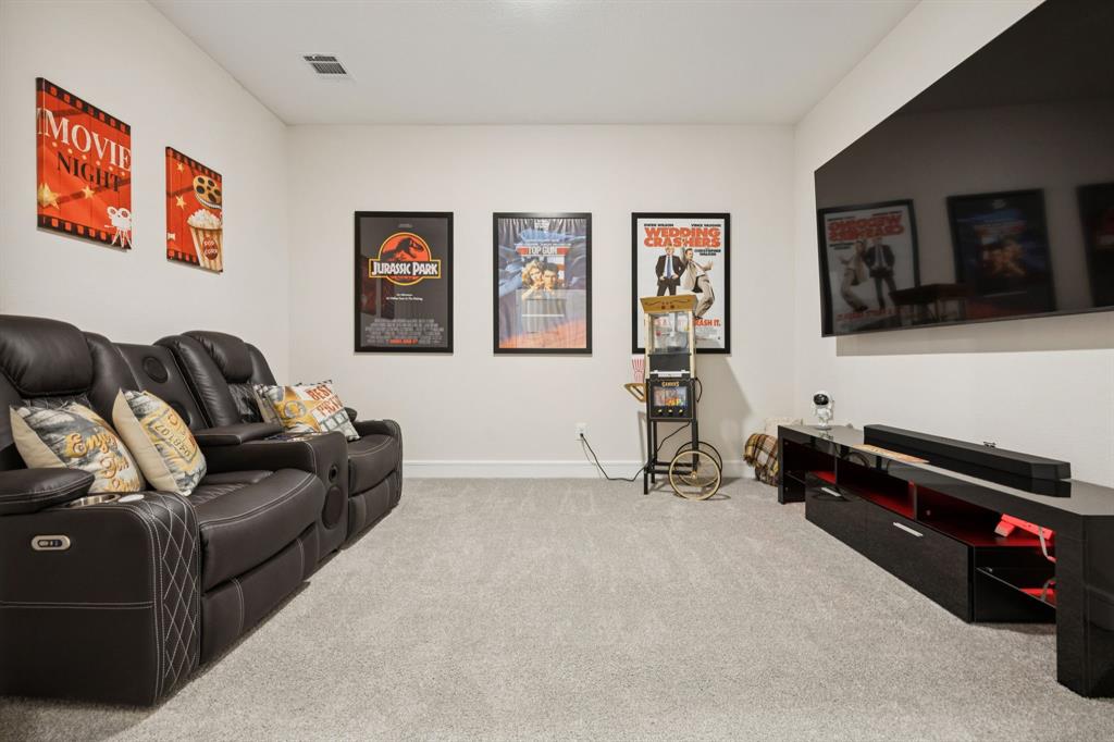 1415 Potenza Road Fate, TX 75087 - Photo 14 of 29 a living room with furniture