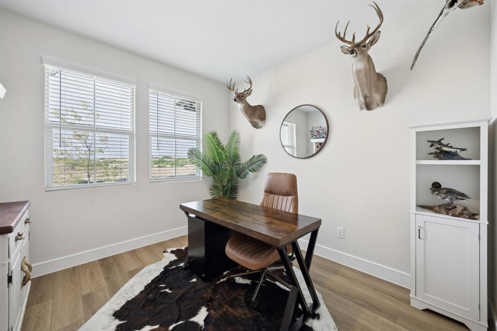 1415 Potenza Road Fate, TX 75087 - Photo 15 of 29 a workspace with furniture and a window