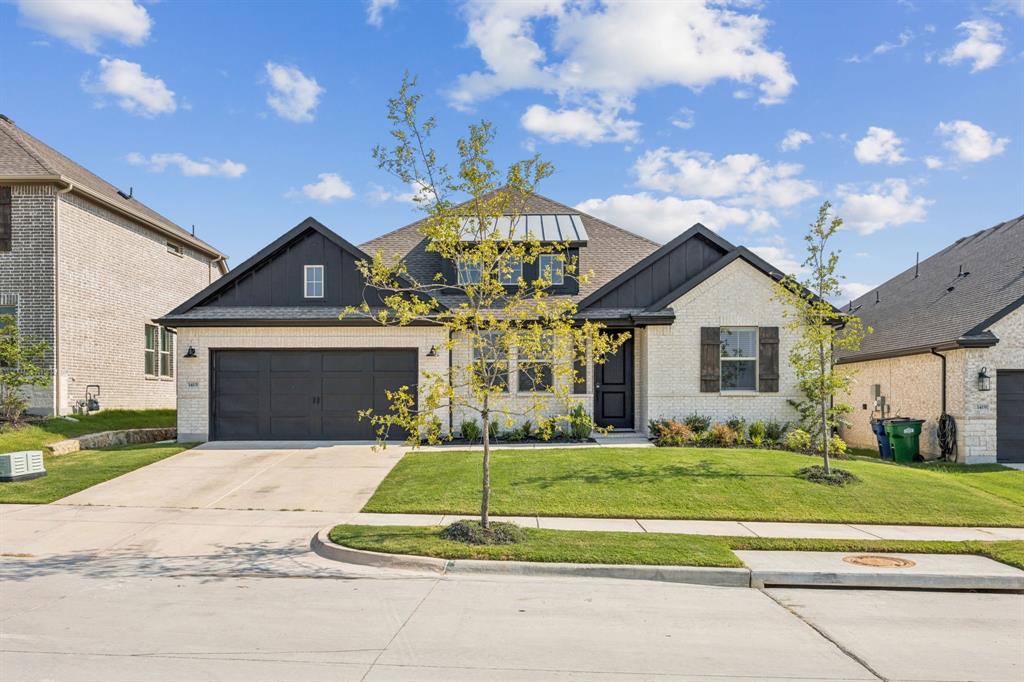 1415 Potenza Road Fate, TX 75087 - Photo 2 of 29 a front view of a house with a yard