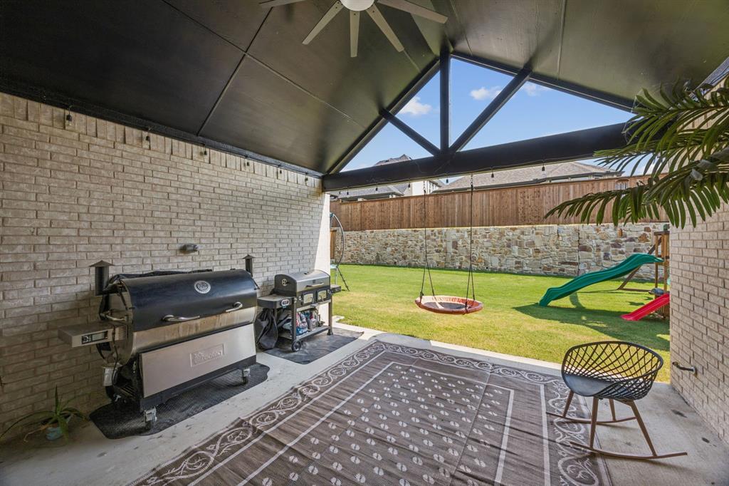 1415 Potenza Road Fate, TX 75087 - Photo 24 of 29 a outdoor space with the couch and a potted plant