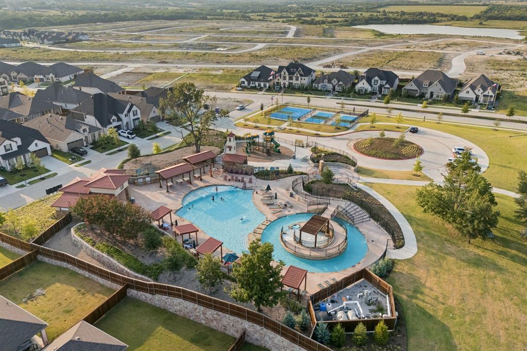 1415 Potenza Road Fate, TX 75087 - Photo 28 of 29 a view of a swimming pool and outside view