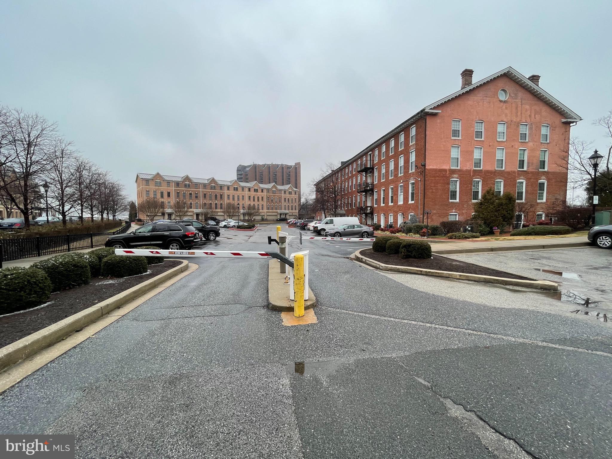 2639 Boston Street, Unit 102 Baltimore, MD 21224 - Photo 6 of 6 a view of a city street with cars
