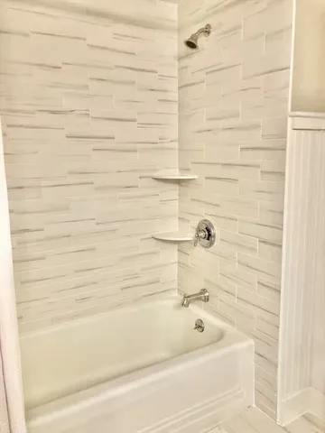 a bathroom with a bathtub