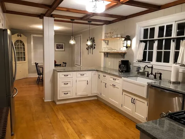 a large kitchen with cabinets