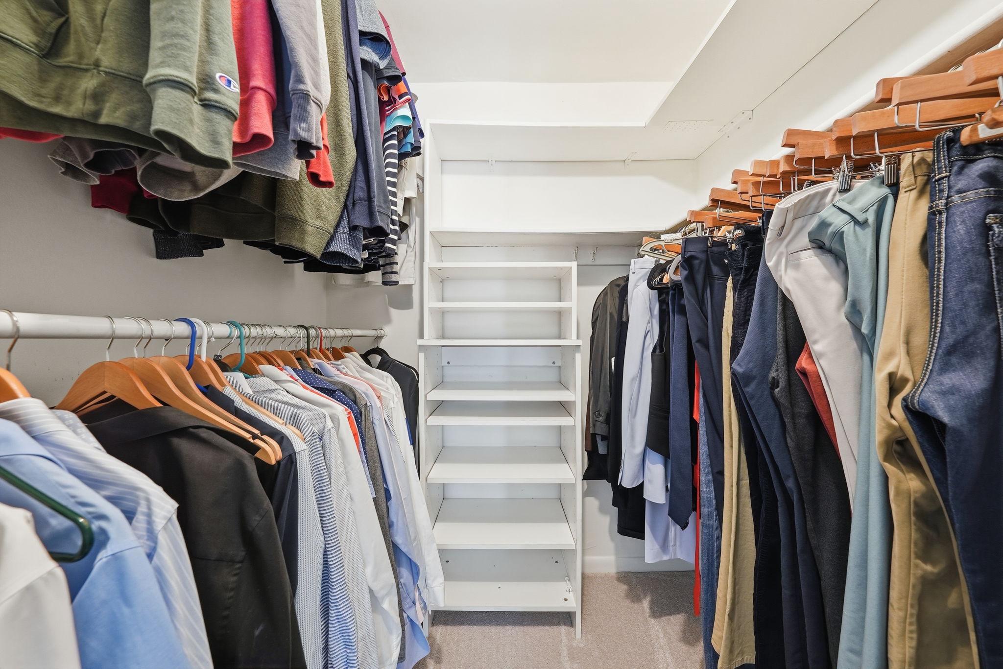11252 Chestnut Grove Square, Unit 248 Reston, VA 20190 - Photo 12 of 25 Stylish walk-in closet with extensive shelving