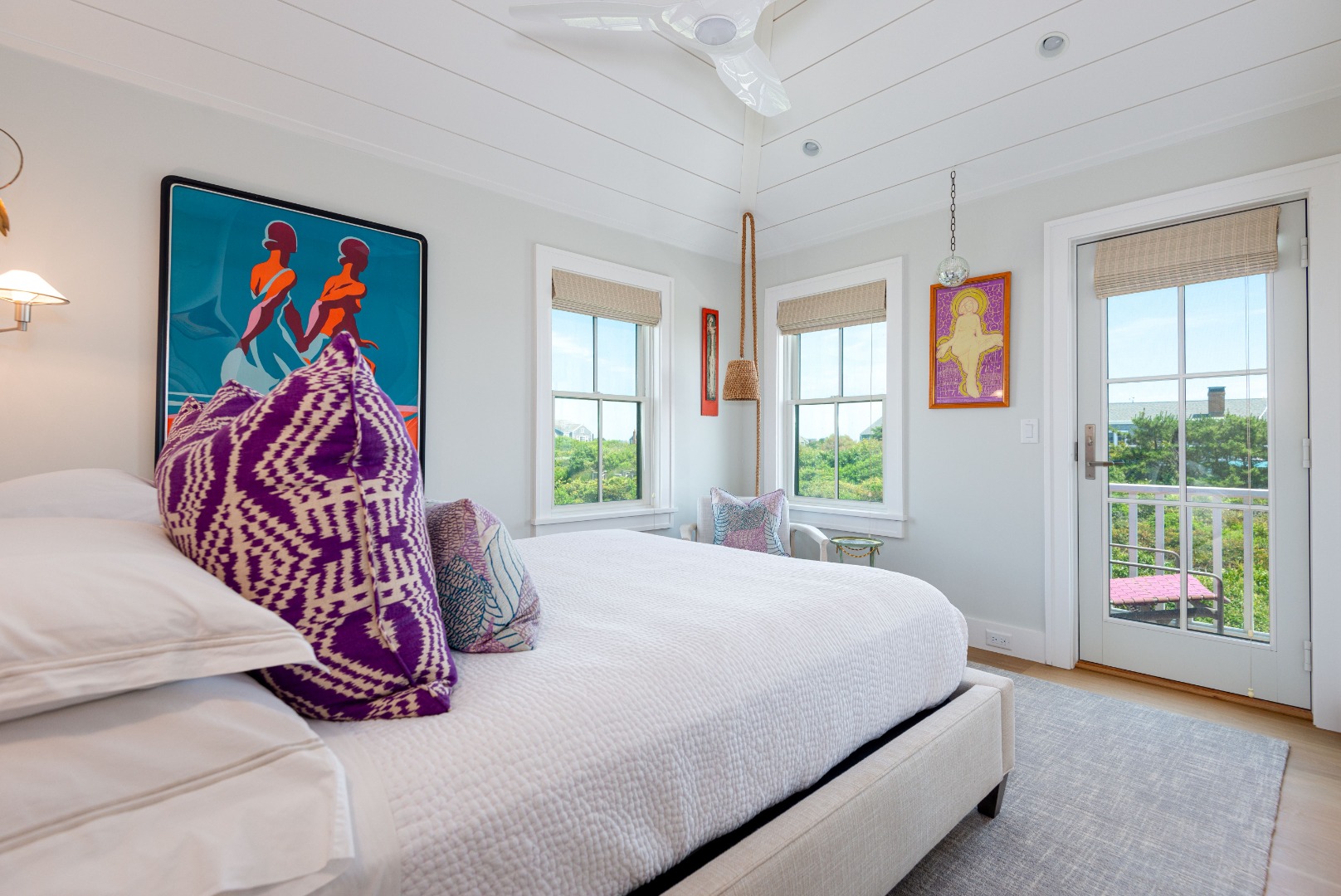 34 Bosworth Road Nantucket, MA 02554 - Photo 10 of 38 a bedroom with a bed and a painting on the wall