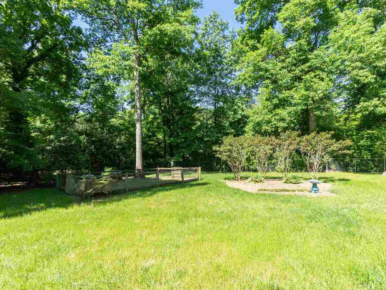 800 Faulkner Place Raleigh, NC 27609 - Photo 27 of 28 Backyard with fenced garden