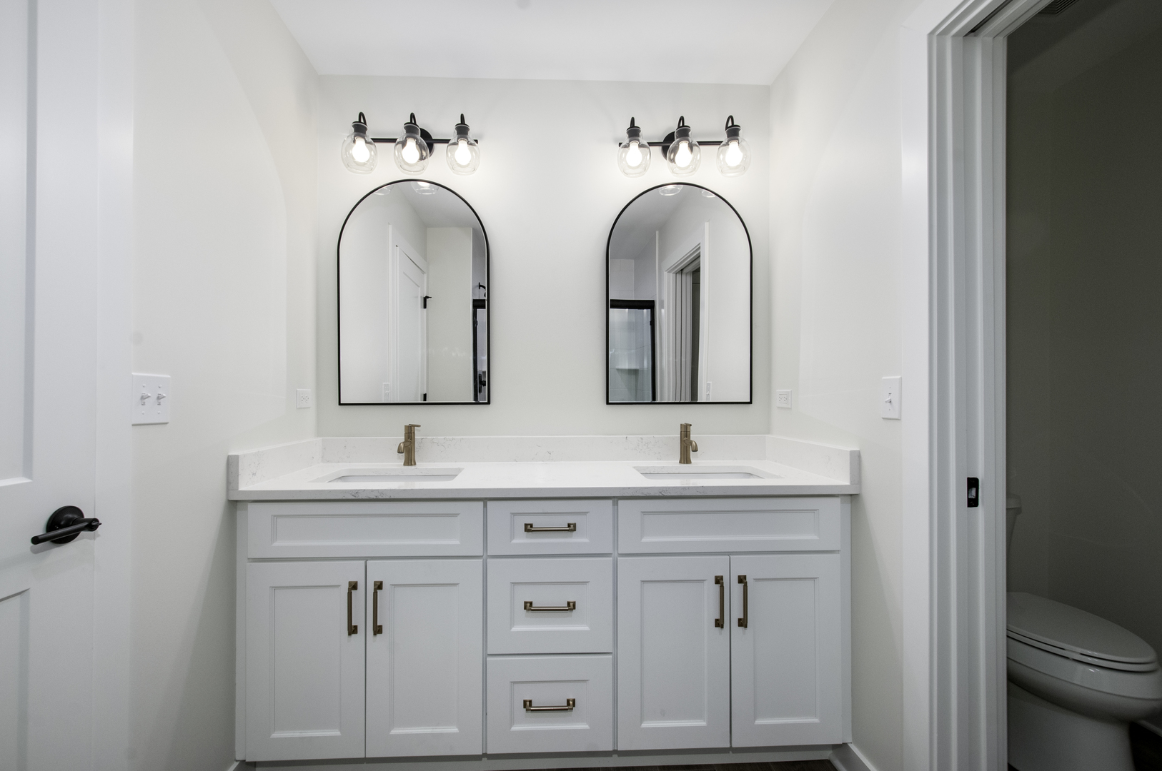 1075 Freedom Road Elburn, IL 60119 - Photo 14 of 18 a bathroom with a double vanity sink and a