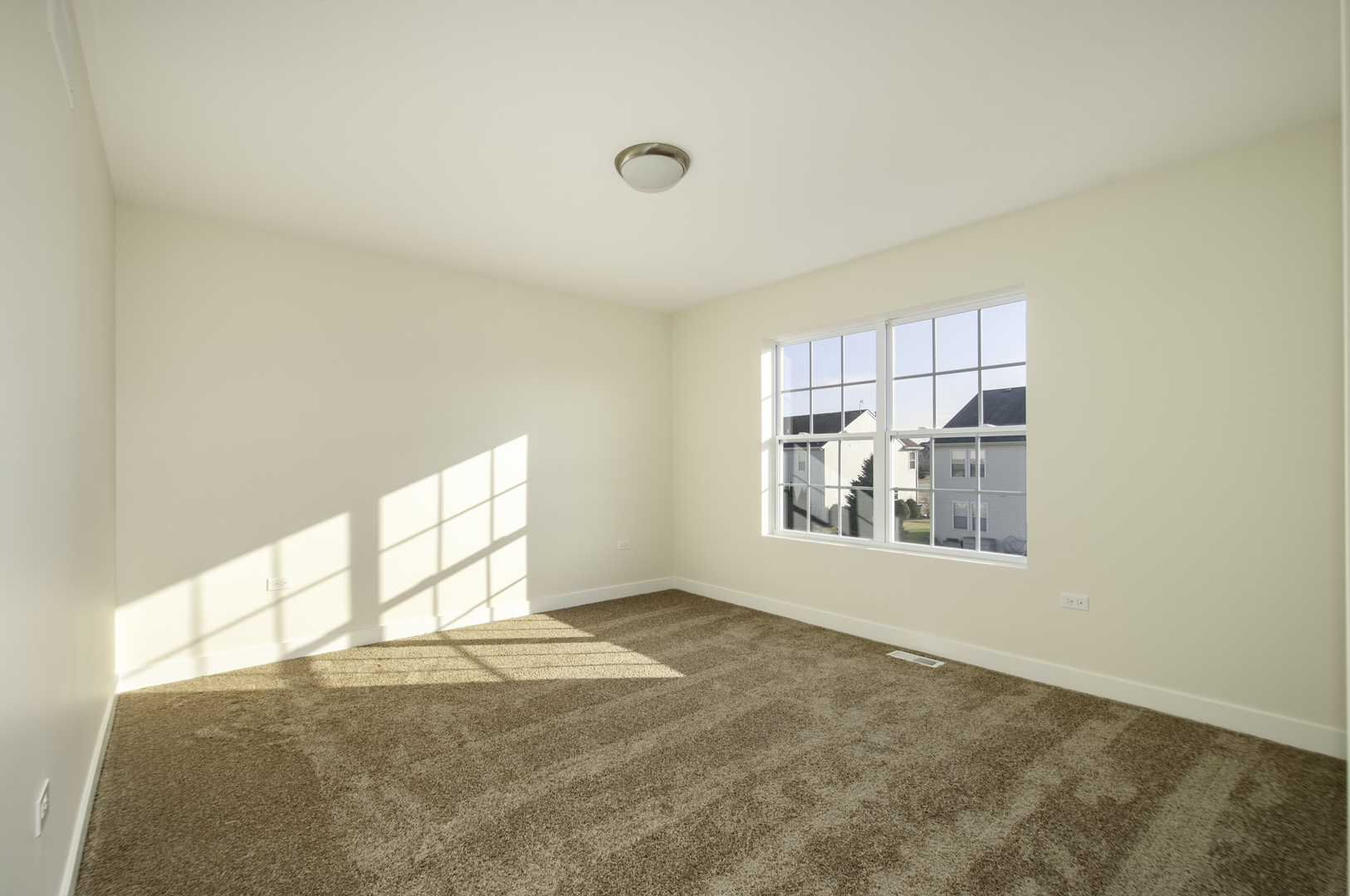 1075 Freedom Road Elburn, IL 60119 - Photo 17 of 18 an empty room with windows