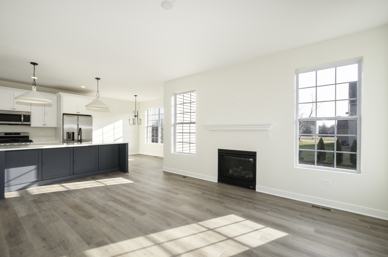 1075 Freedom Road Elburn, IL 60119 - Photo 6 of 18 a view of a kitchen with a sink and a window