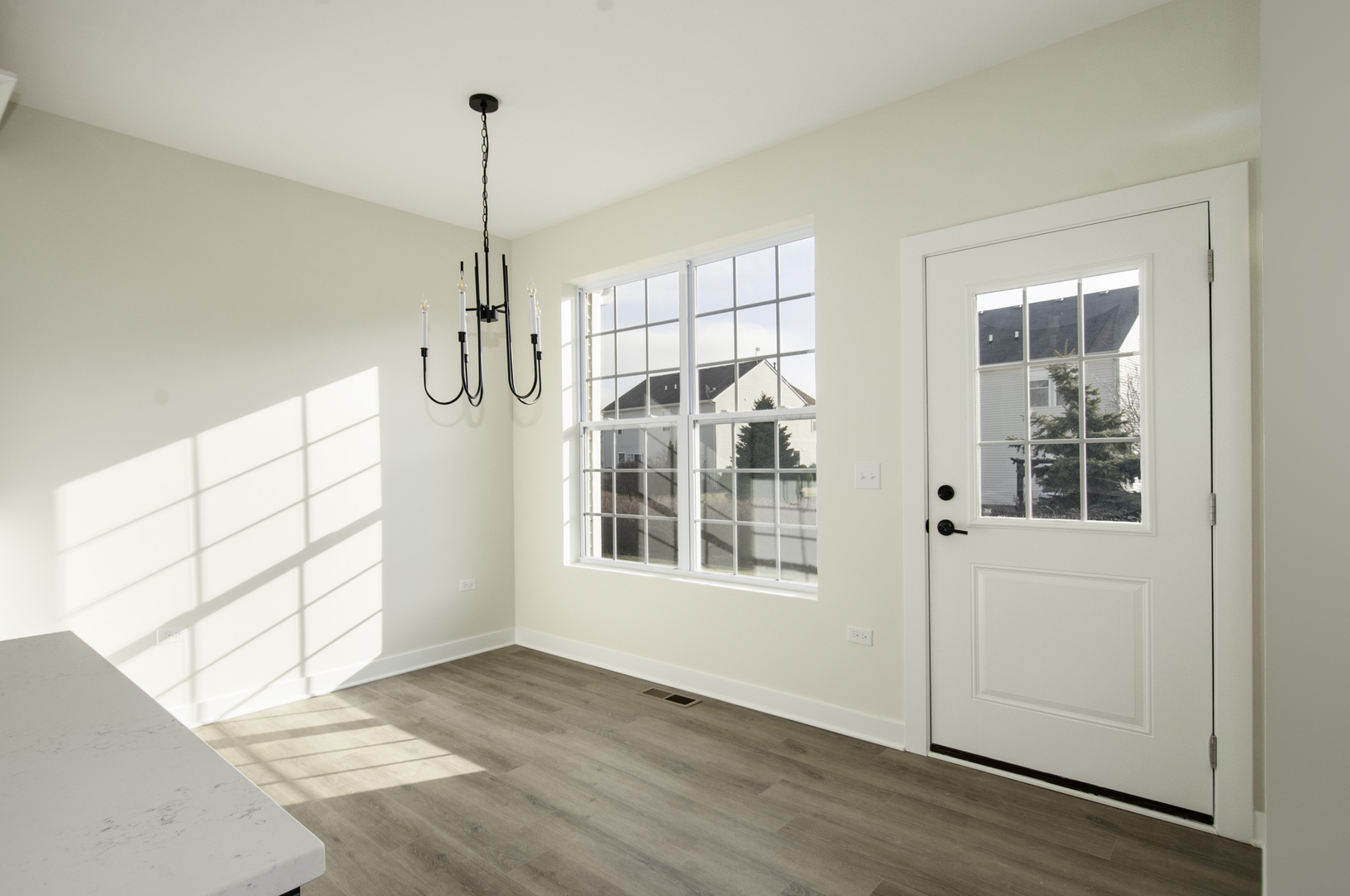 1075 Freedom Road Elburn, IL 60119 - Photo 7 of 18 a view of empty room with windows