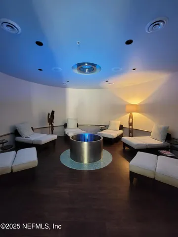 a view of living room with furniture and window