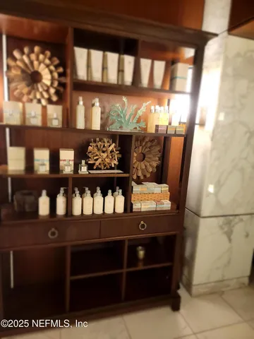 a view of a swimming pool with an outdoor seating