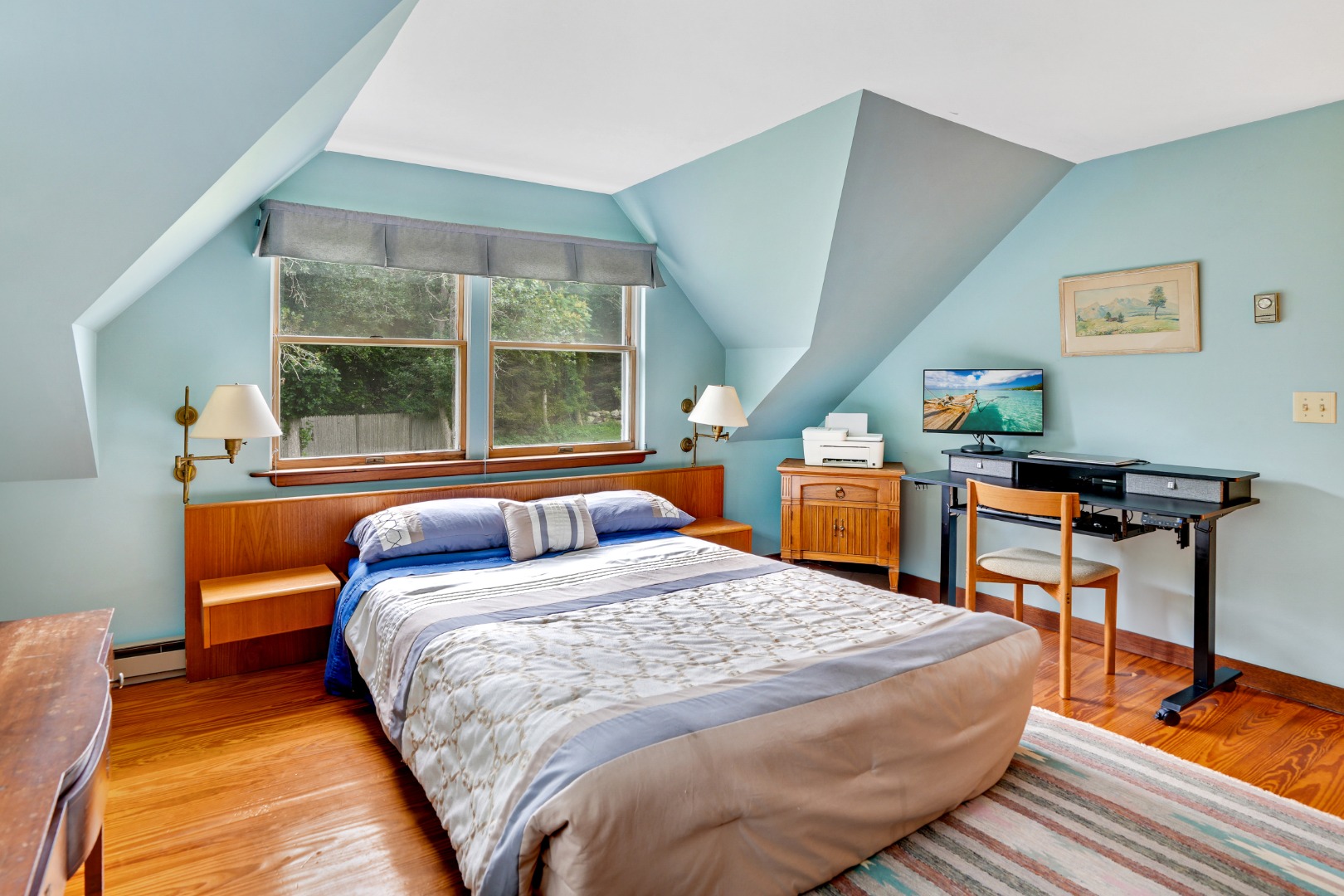 174 Middle Road Chilmark, MA 02535 - Photo 22 of 40 a bedroom with a bed and wooden floor