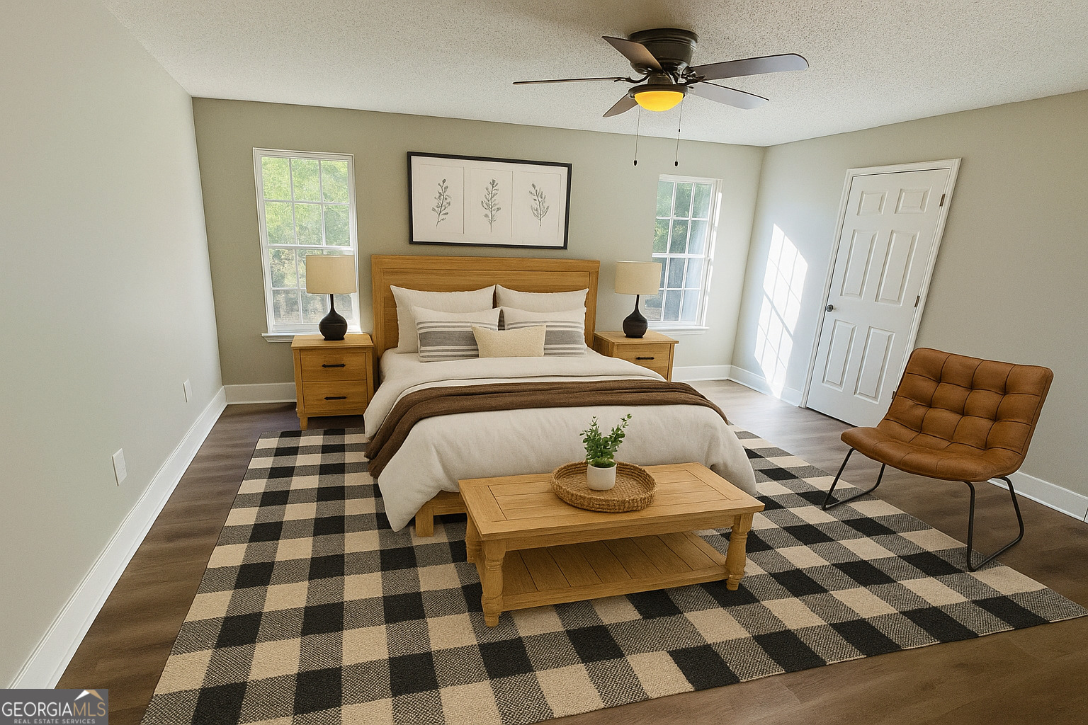 1516 Stark Road Jackson, GA 30233 - Photo 13 of 37 a bedroom with a bed and wooden floor