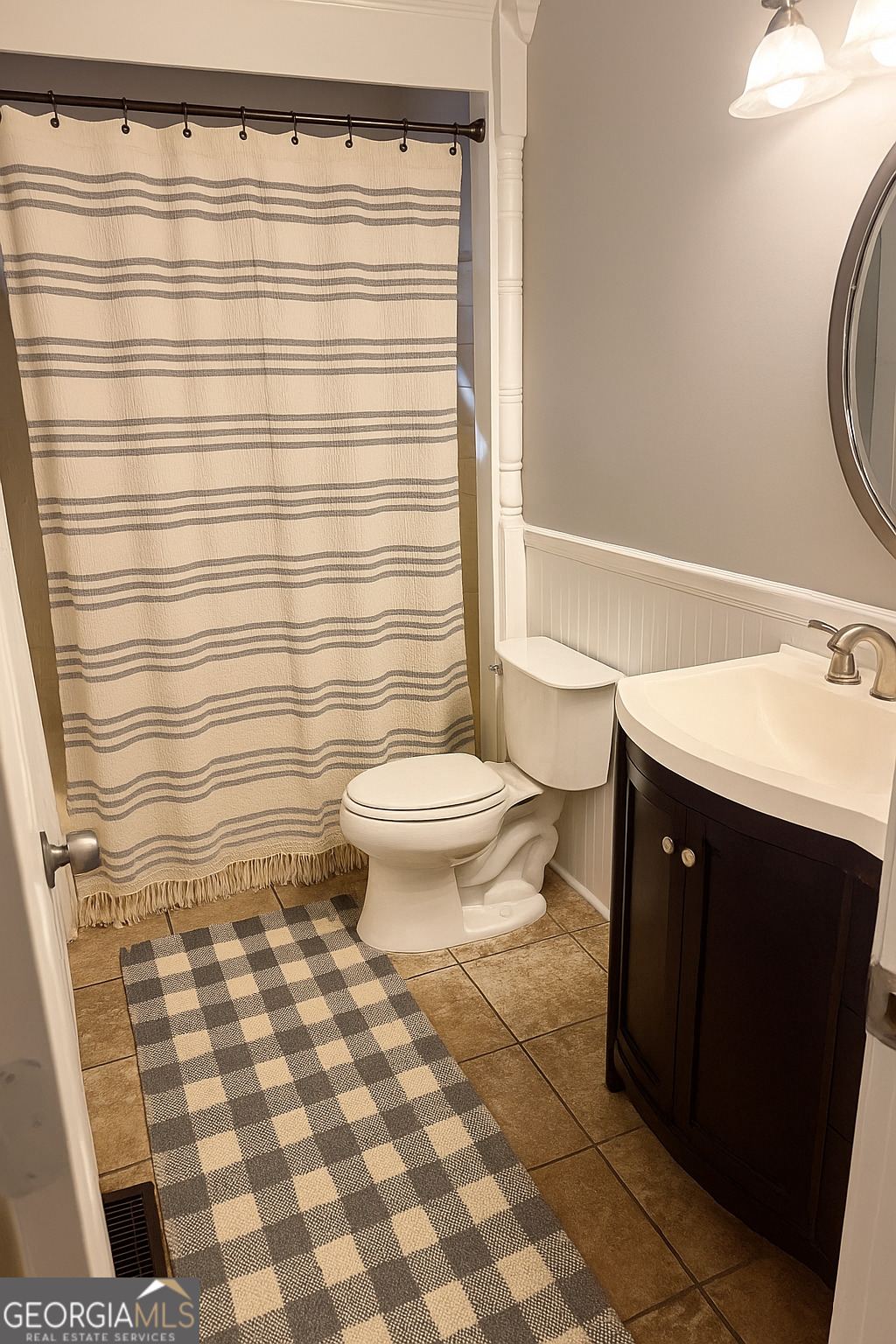1516 Stark Road Jackson, GA 30233 - Photo 14 of 37 a bathroom with a sink toilet and shower