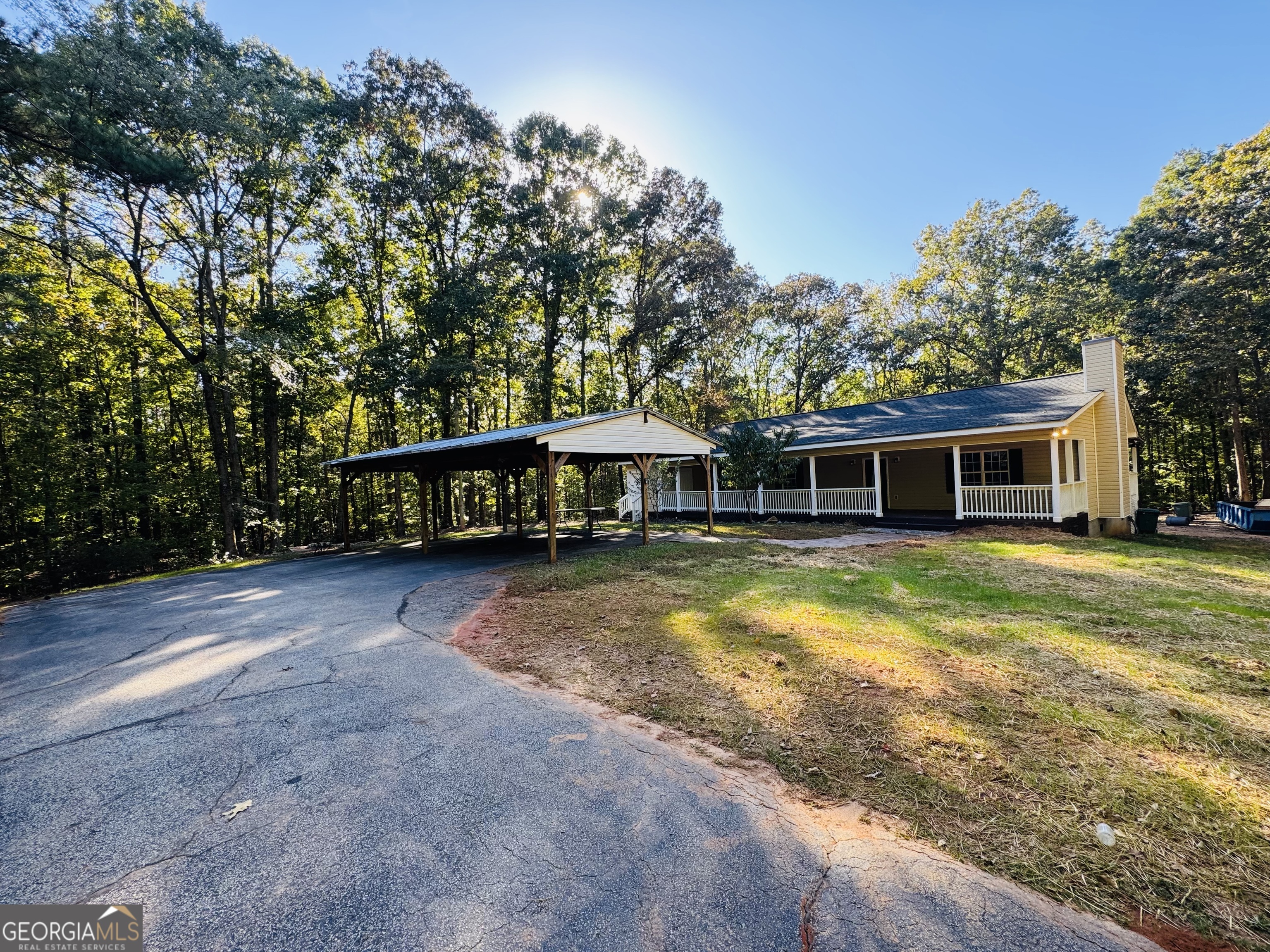 1516 Stark Road Jackson, GA 30233 - Photo 2 of 37 a view of a house with a swimming pool and a yard