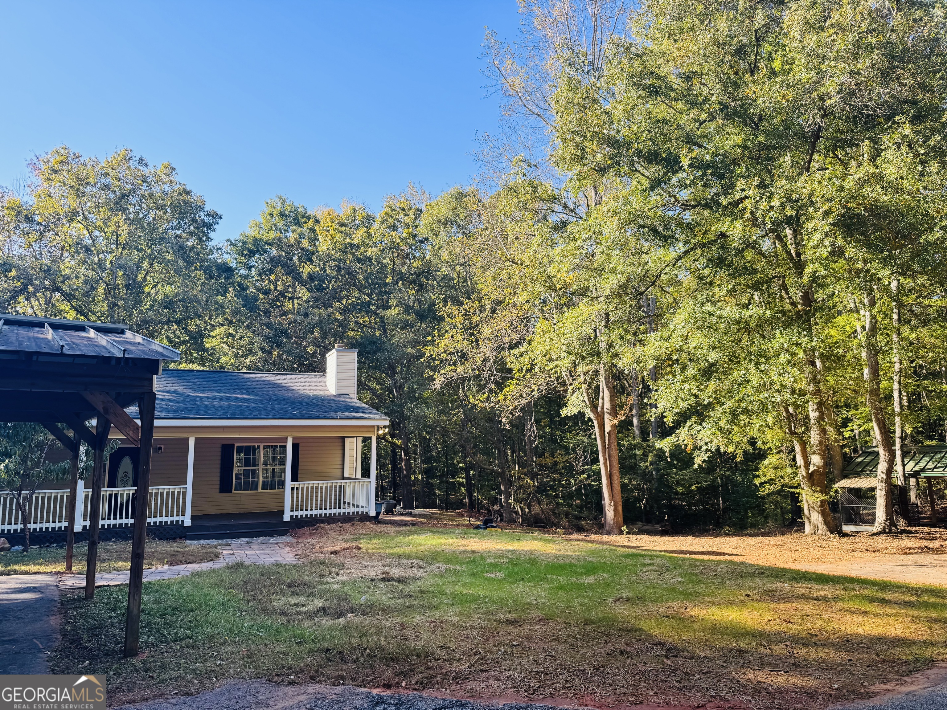 1516 Stark Road Jackson, GA 30233 - Photo 31 of 37 a front view of a house with a yard