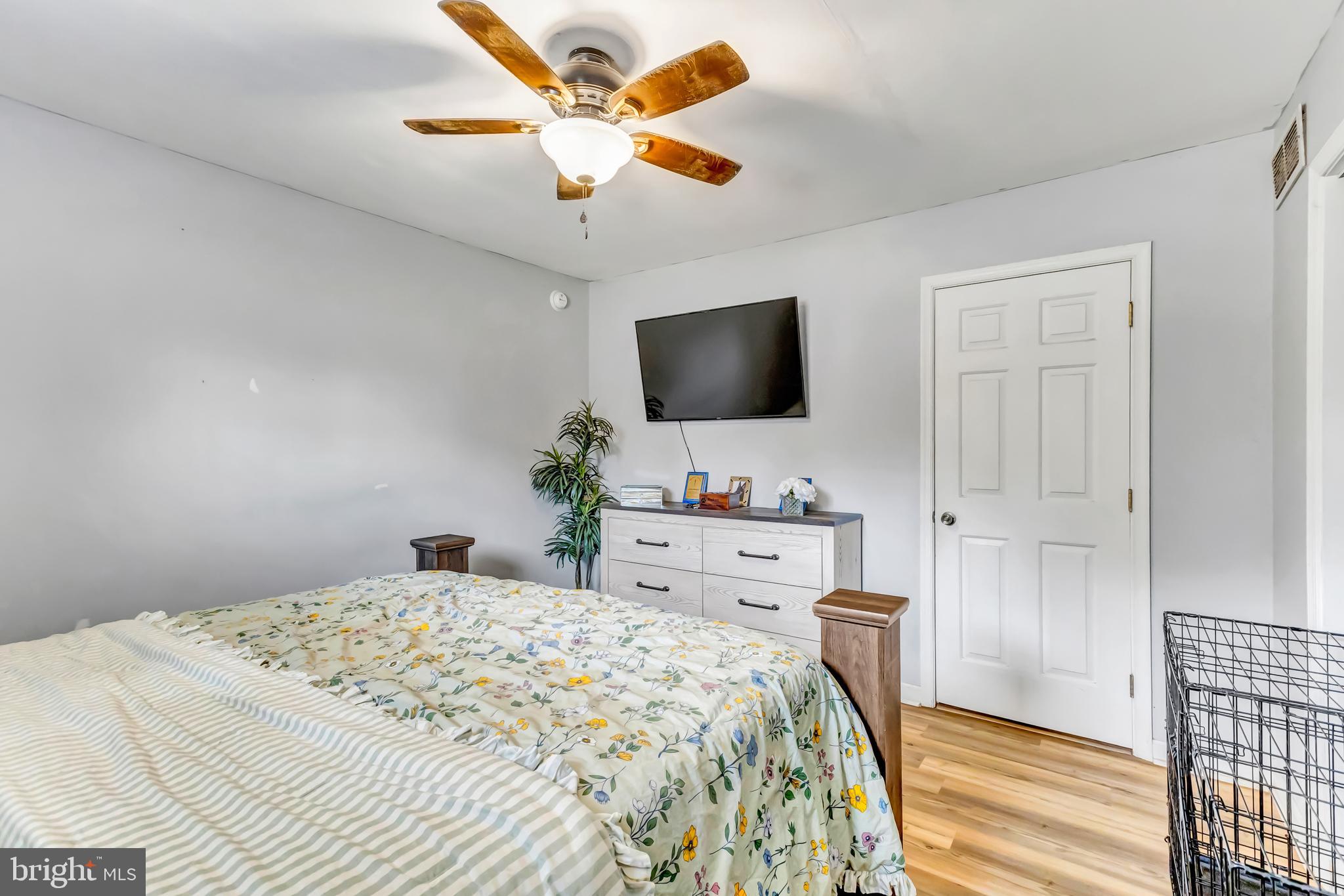 4925 Campground Road Eden, MD 21822 - Photo 16 of 42 a bedroom with a bed and a flat screen tv
