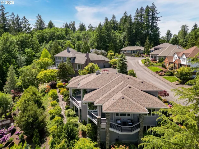 an aerial view of a house with a garden
