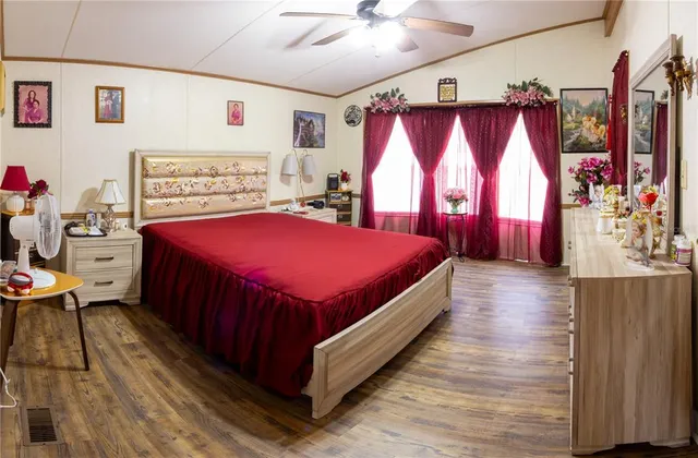 a bed room with a bed and a window