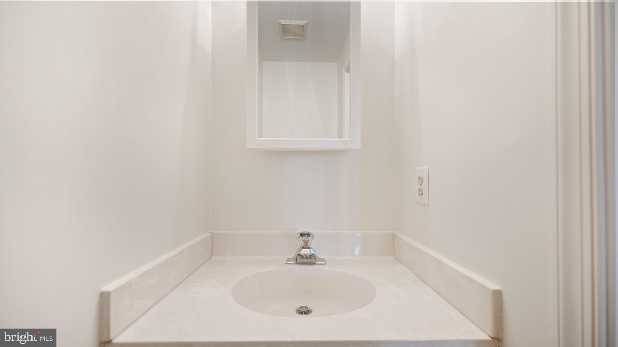 16039 Partnership Road Poolesville, MD 20837 - Photo 48 of 97 Main House main level powder room