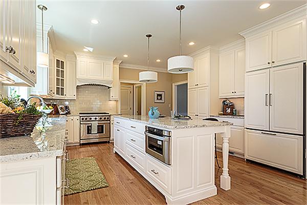 146 East Street Lexington, MA 02420 - Photo 4 of 9 a kitchen with stainless steel appliances granite countertop a stove a sink a refrigerator and a refrigerator