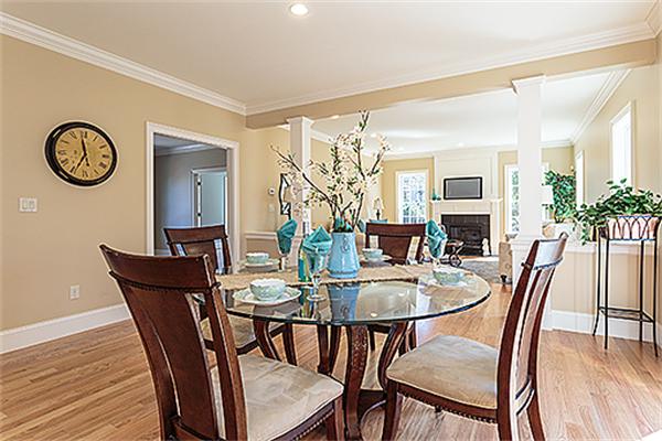 146 East Street Lexington, MA 02420 - Photo 6 of 9 a view of a dining room with furniture window and wooden floor