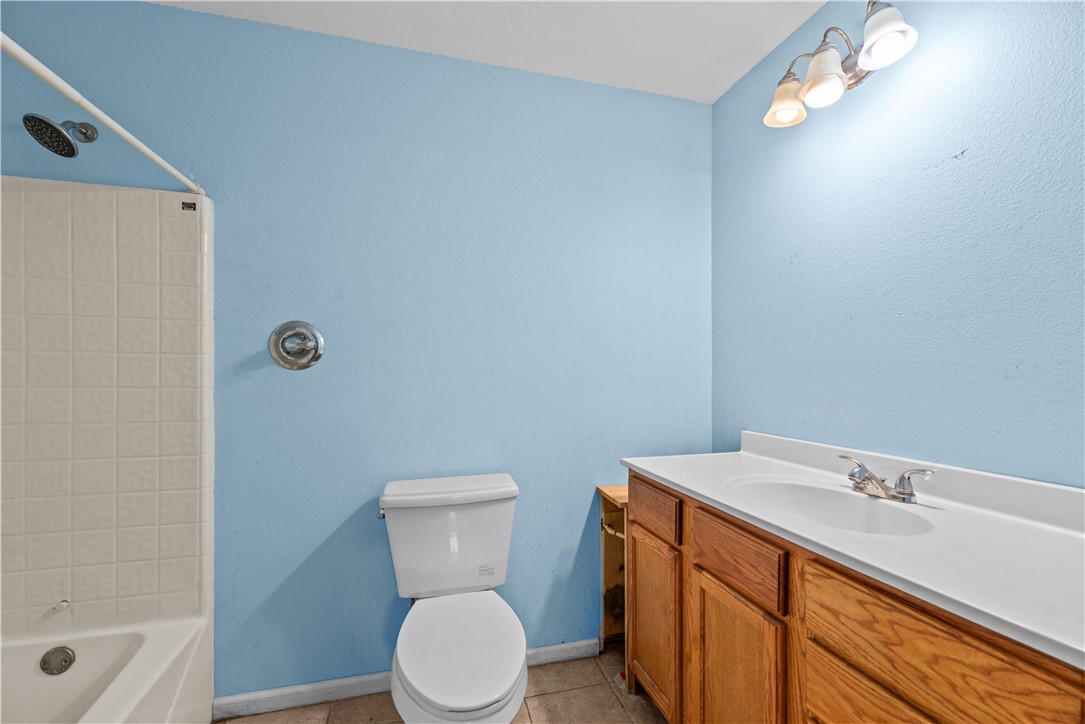 636 South County Road 1150 Riviera, TX 78379 - Photo 10 of 20 a bathroom with a sink a toilet and shower