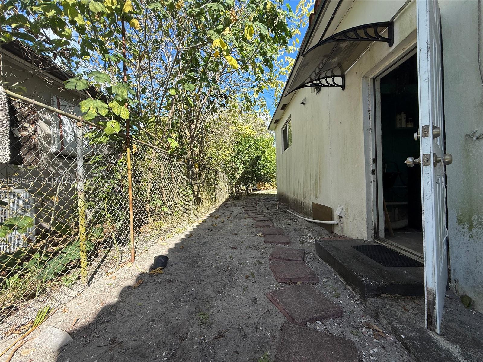 79 Northwest 143rd Street Miami, FL 33168 - Photo 20 of 37 a view of a back yard of the house