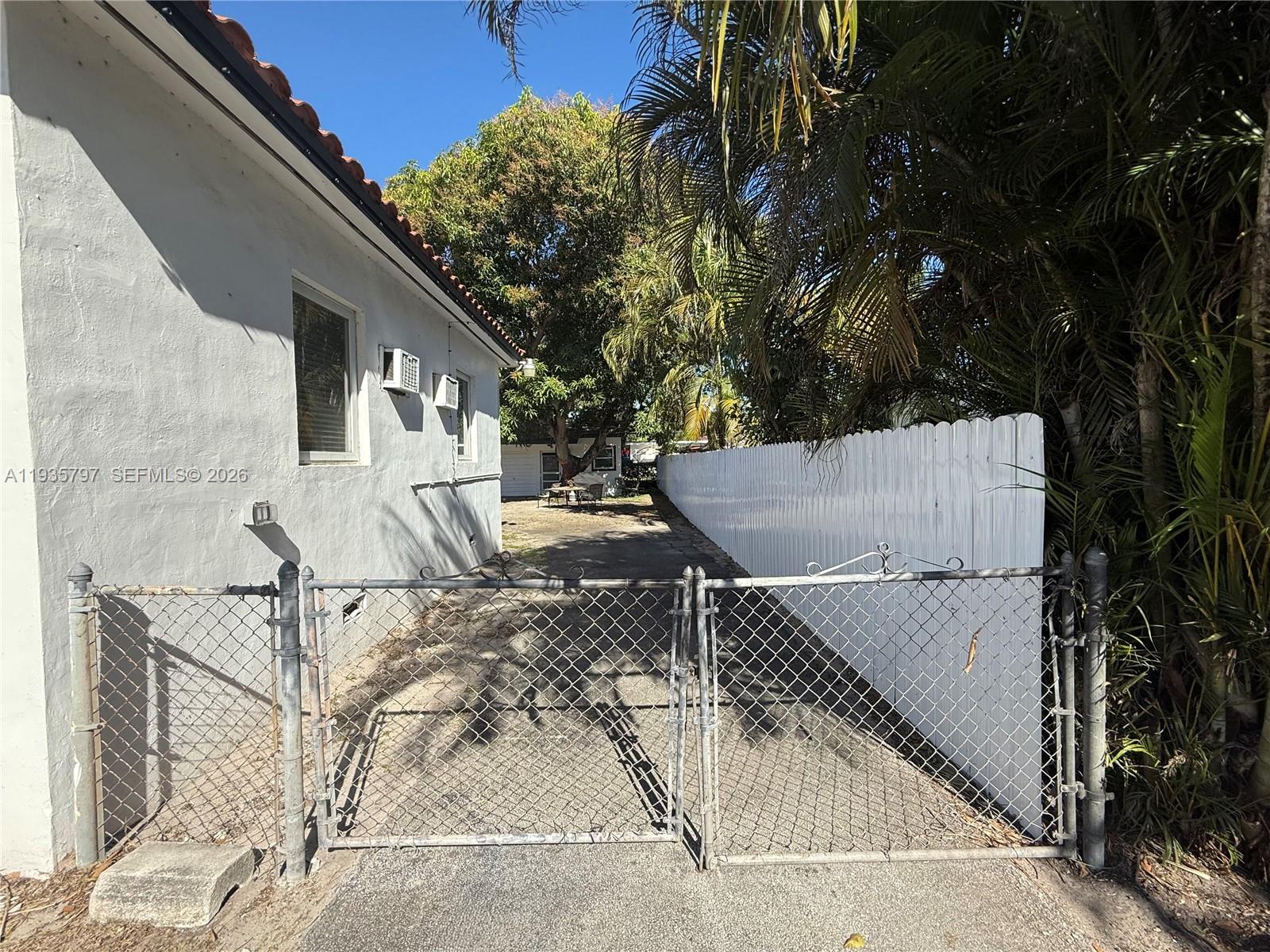 79 Northwest 143rd Street Miami, FL 33168 - Photo 29 of 37 an outdoor space with seating