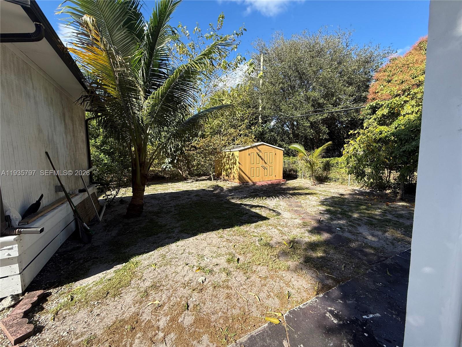79 Northwest 143rd Street Miami, FL 33168 - Photo 36 of 37 a view of outdoor space with garden