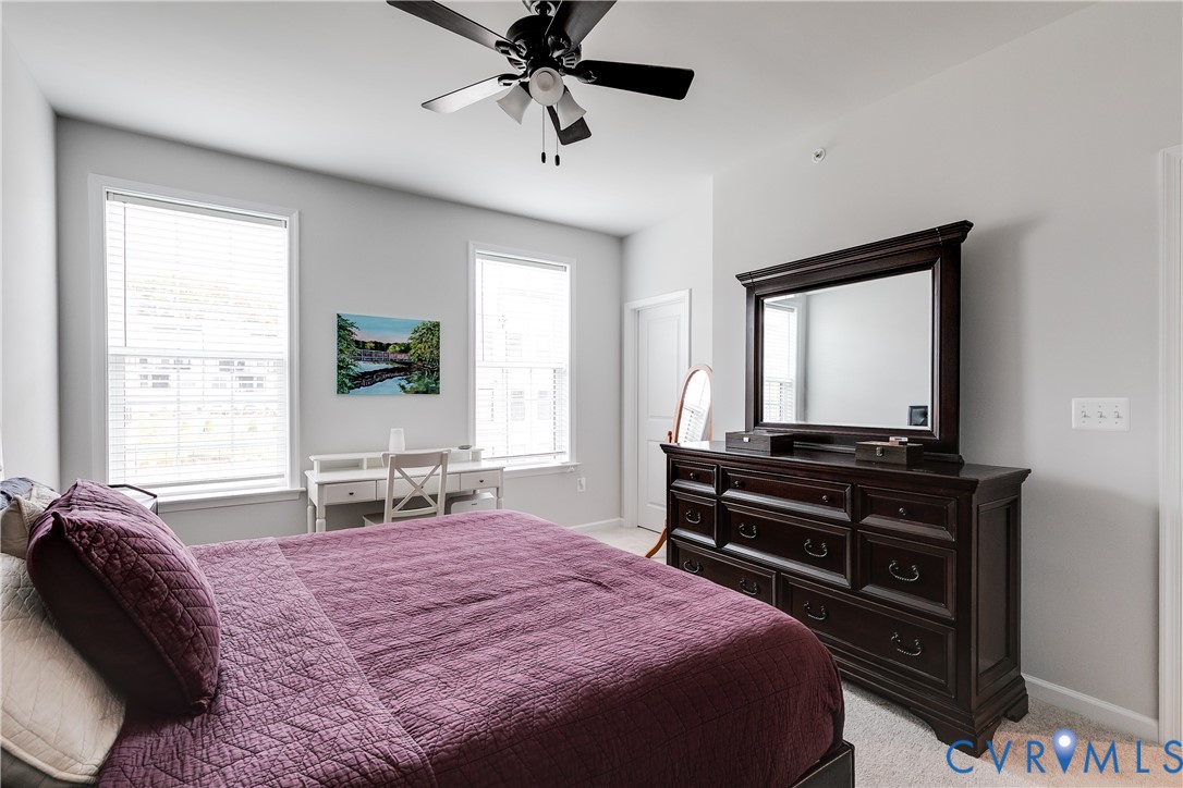 13267 Garland Lane Midlothian, VA 23114 - Photo 21 of 35 a bedroom with a bed and a flat screen tv