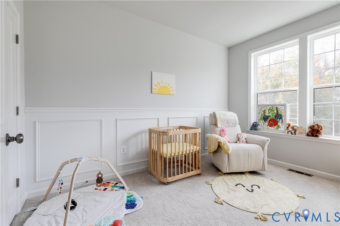 13267 Garland Lane Midlothian, VA 23114 - Photo 23 of 35 a bedroom with furniture and a window