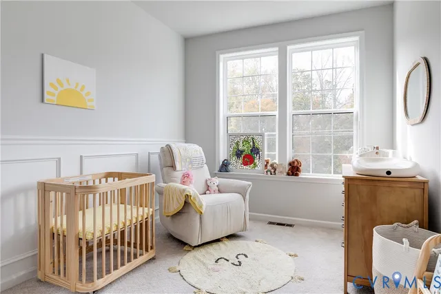 a bedroom with furniture and windows