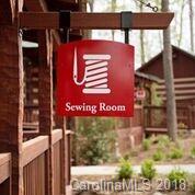 1573 Tranquility Boulevard, Unit 427 Lancaster, SC 29720 - Photo 12 of 12 a sign that is on the side of a building