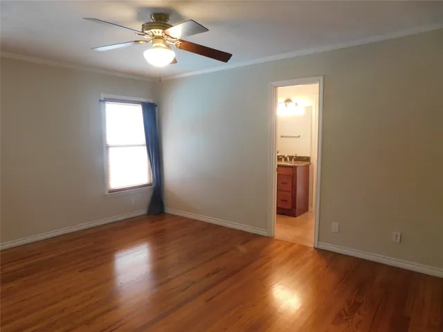 a swimming pool with some trees in the background