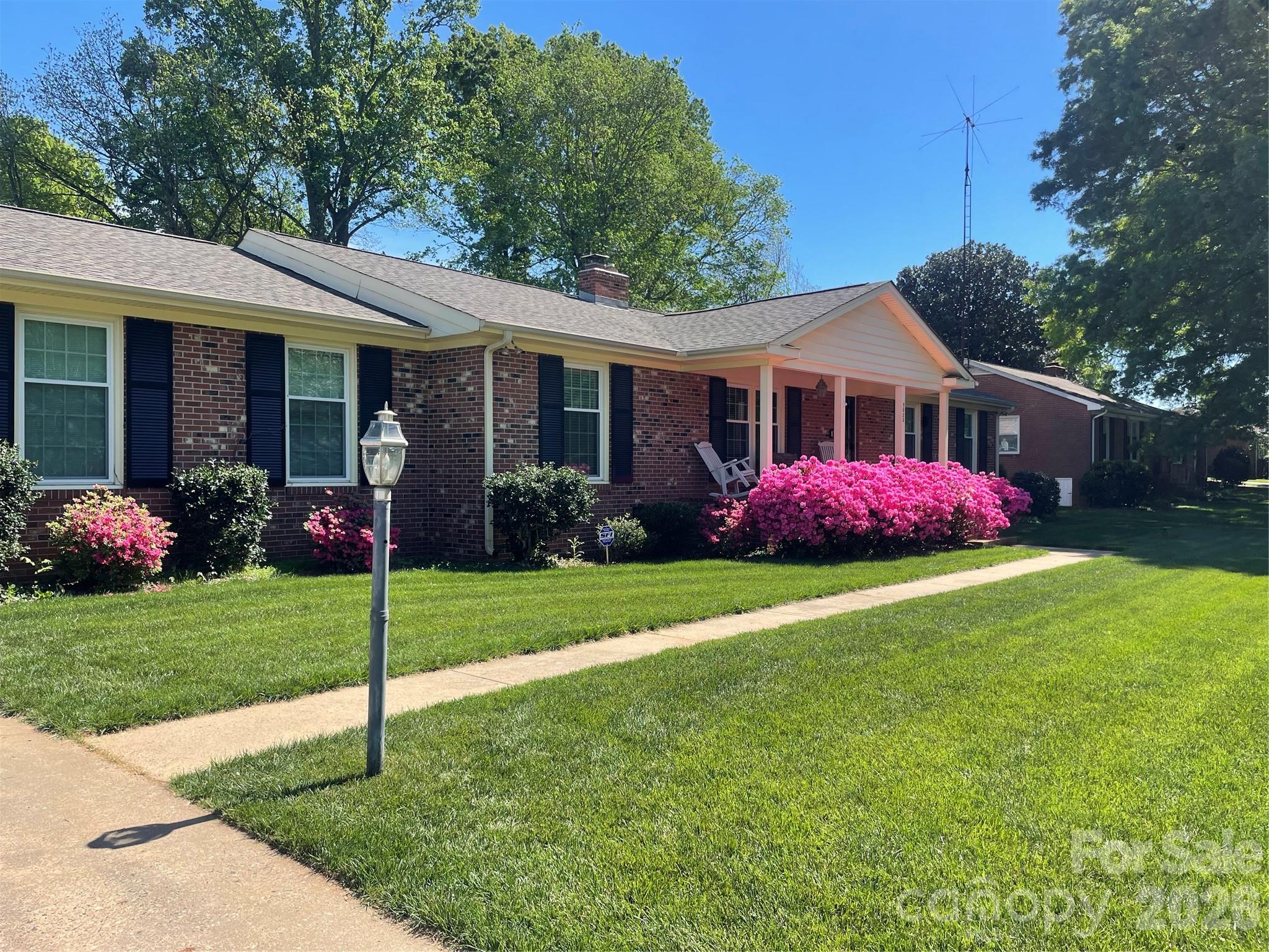 5022 Cheviot Road Charlotte, NC 28269 - Photo 4 of 4 a front view of a house with garden