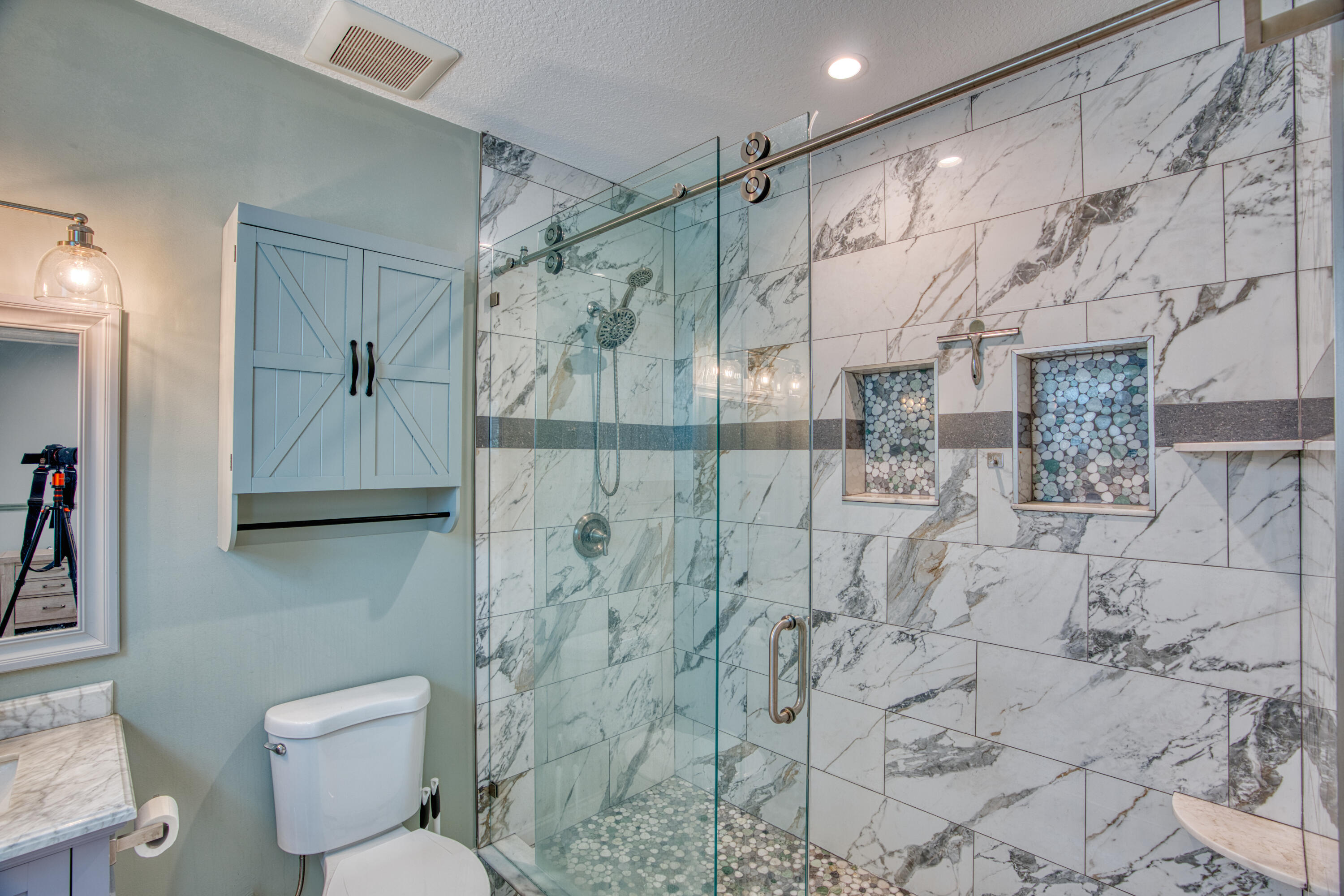 499 Beach Road Tavernier, FL 33070 - Photo 24 of 53 a bathroom with a toilet sink and shower