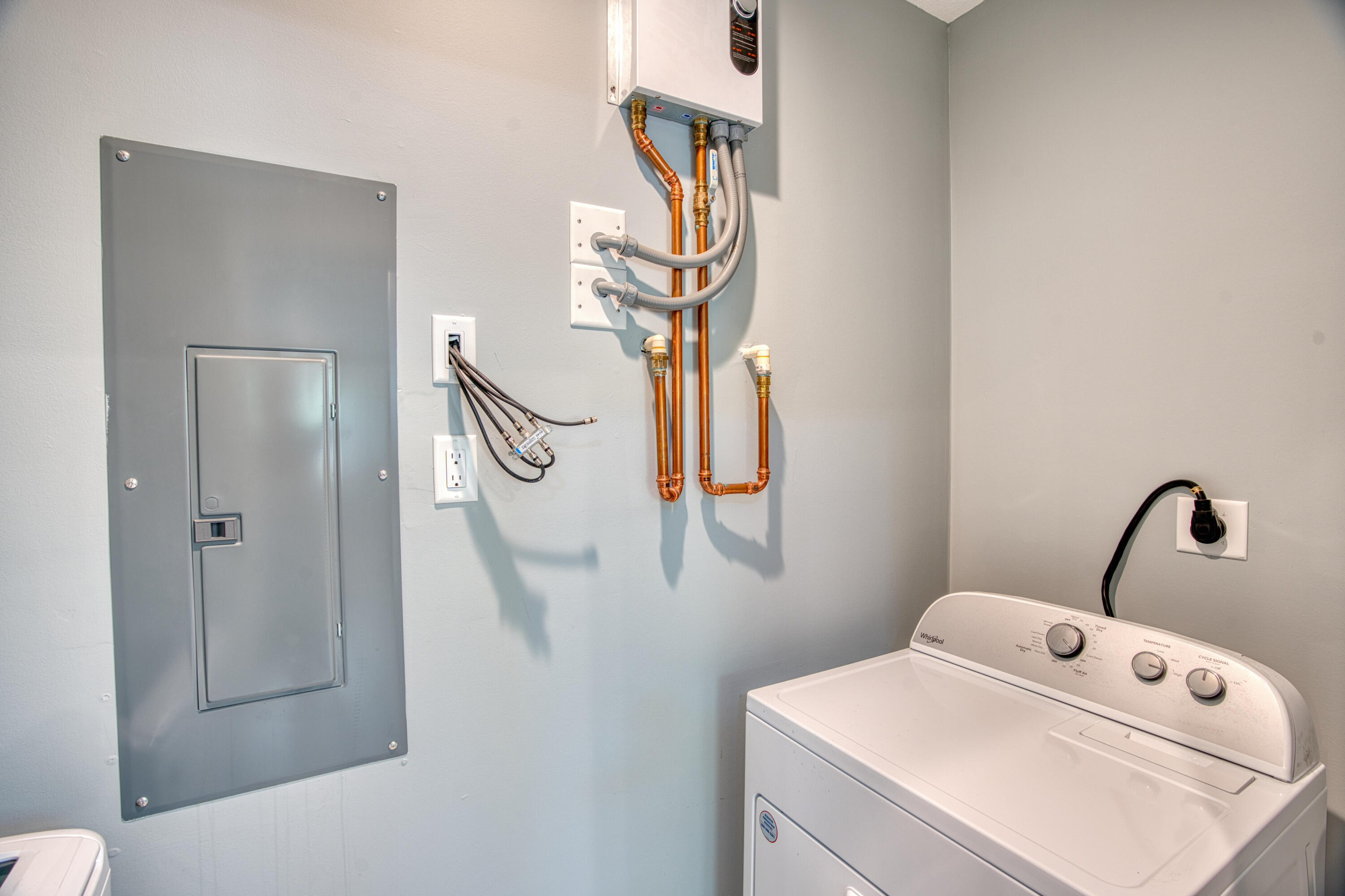 499 Beach Road Tavernier, FL 33070 - Photo 32 of 53 a bathroom with a sink vanity and mirror