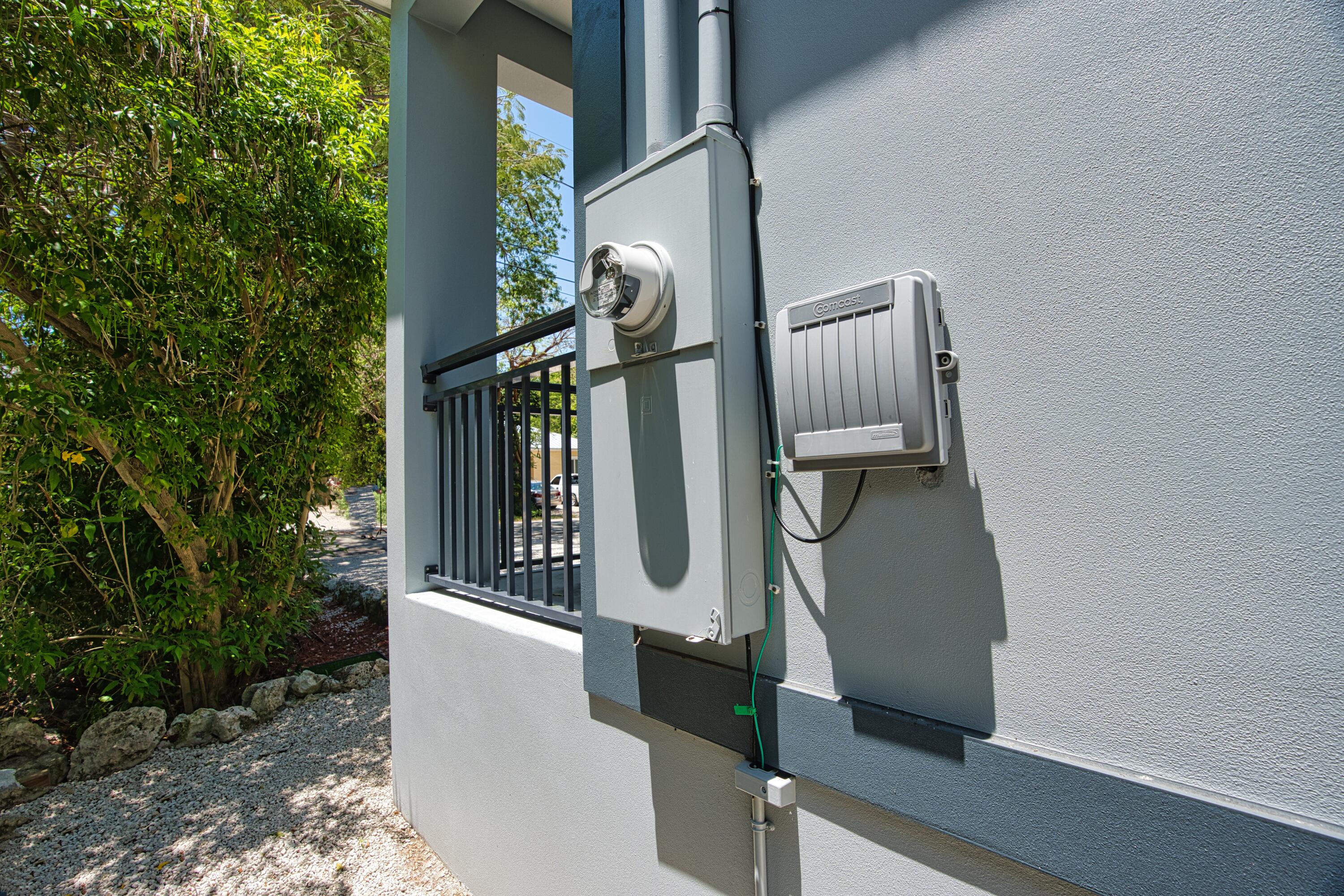 499 Beach Road Tavernier, FL 33070 - Photo 45 of 53 a front view of a house with chairs