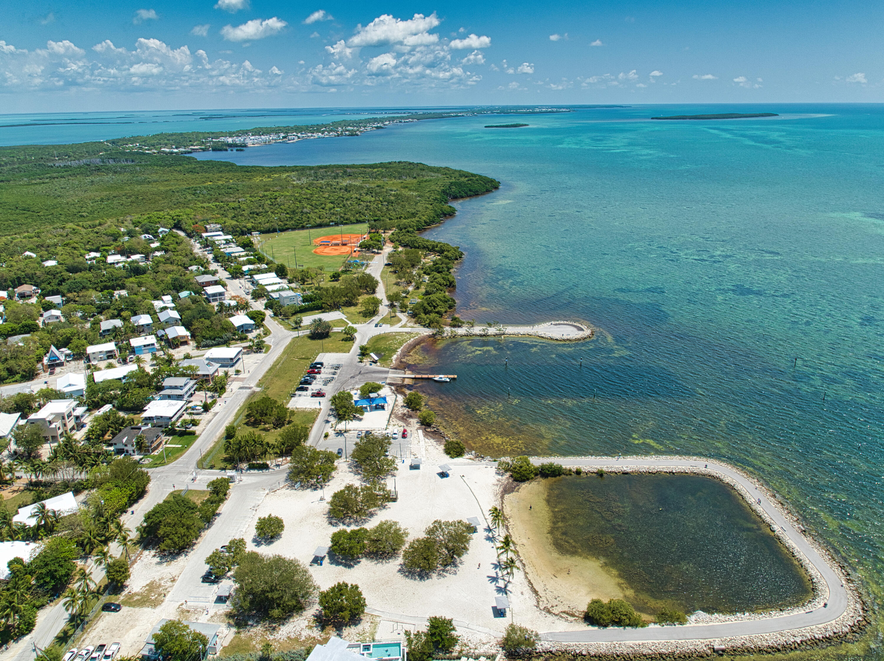 499 Beach Road Tavernier, FL 33070 - Photo 53 of 53 a view of swimming pool from a yard