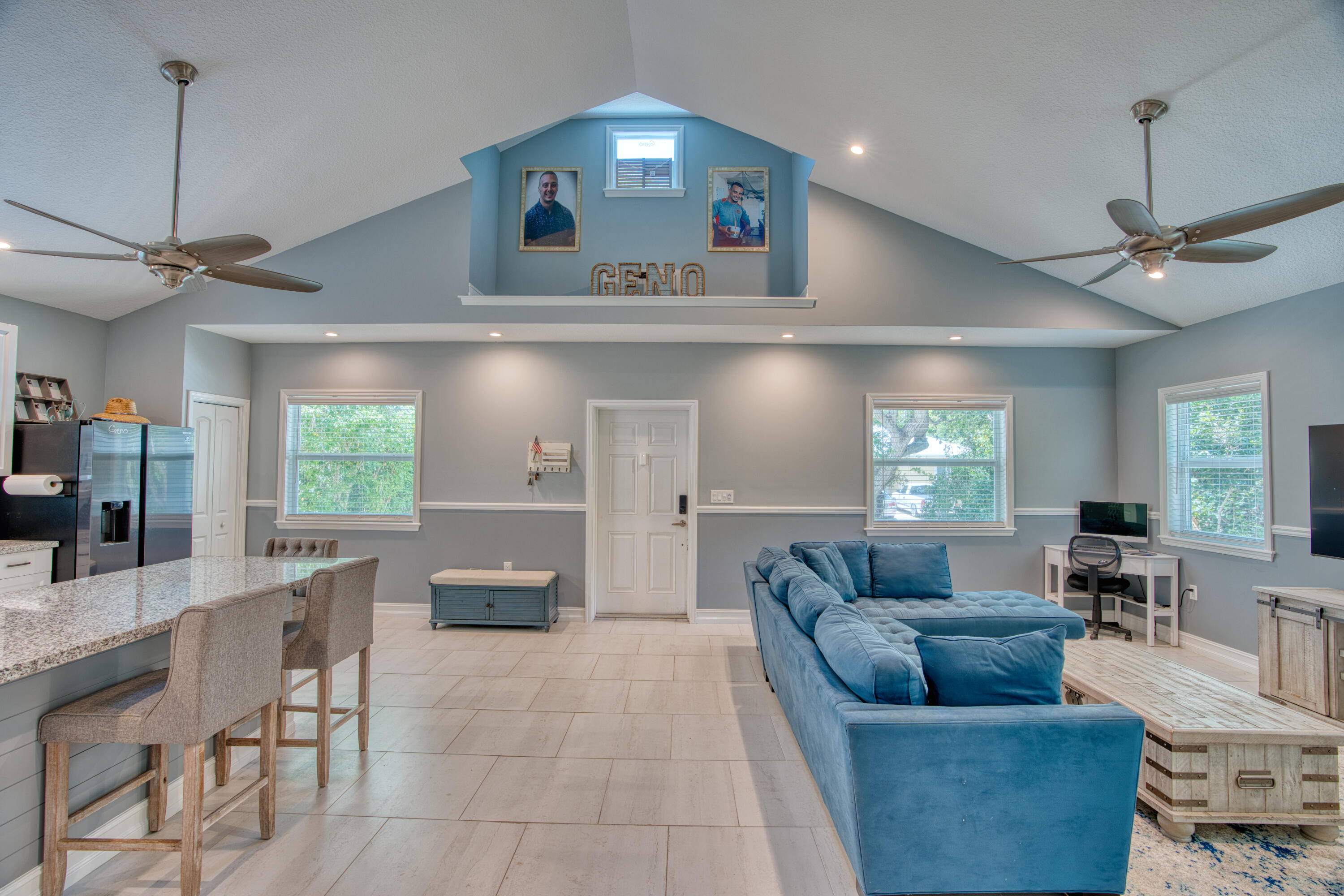 499 Beach Road Tavernier, FL 33070 - Photo 9 of 53 a living room with furniture and a chandelier