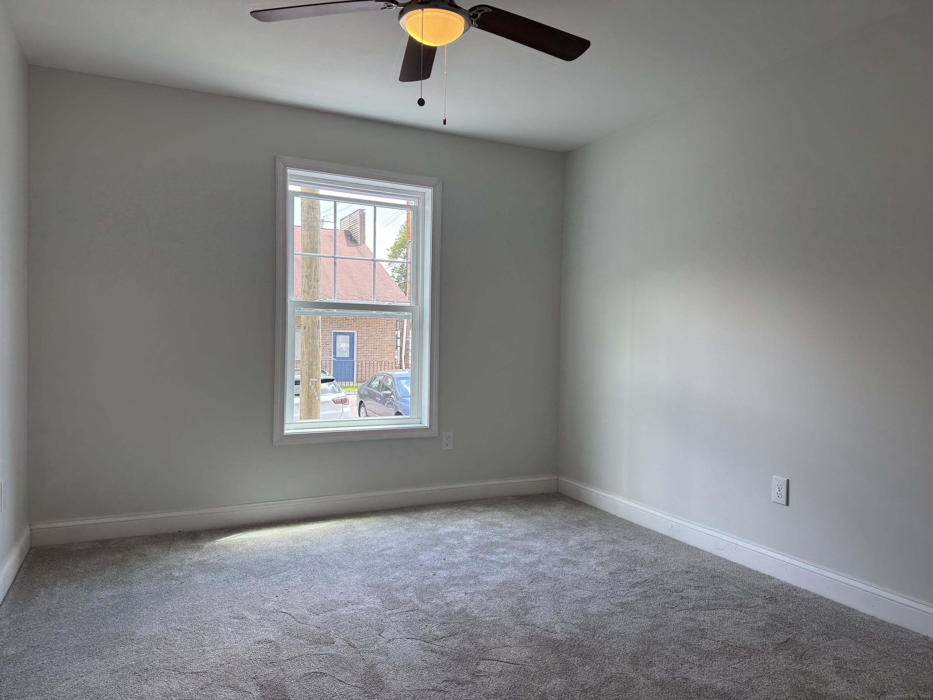 1085 Whalley Avenue, Unit 11 New Haven, CT 06515 - Photo 12 of 17 an empty room with window